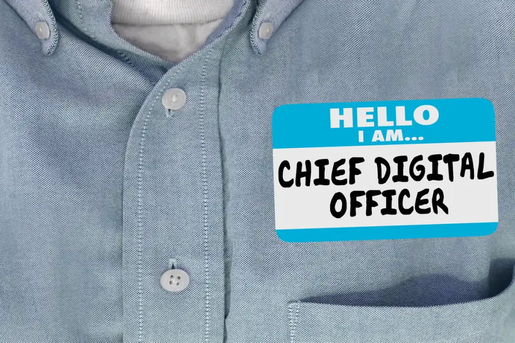 Close up of name tag stating ‘Chief Digital Officer’