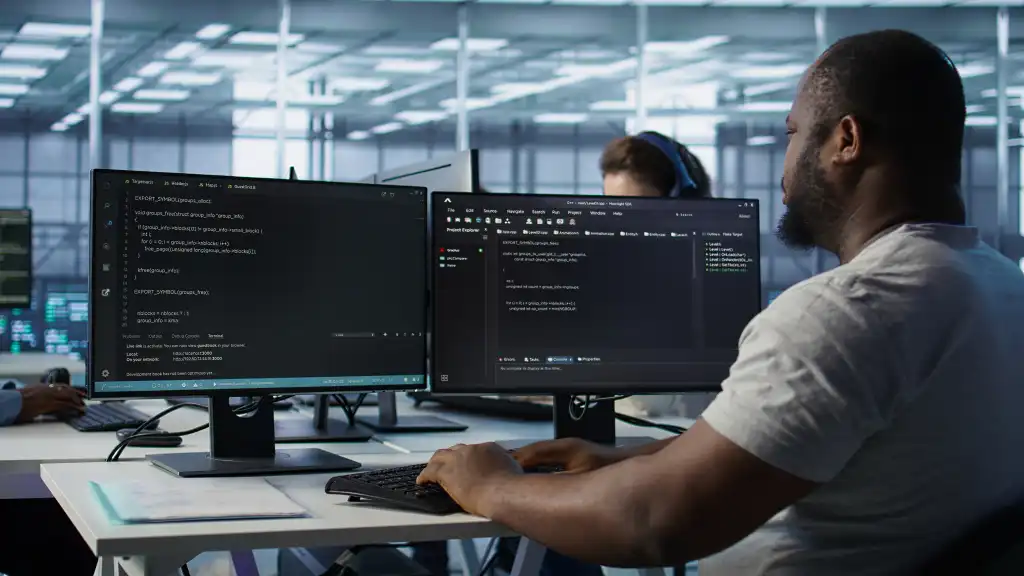 Admin in server hub tasked with protecting valuable data against hacking attack on computers. African american worker safeguarding data center against unauthorized access and vulnerabilities, camera B