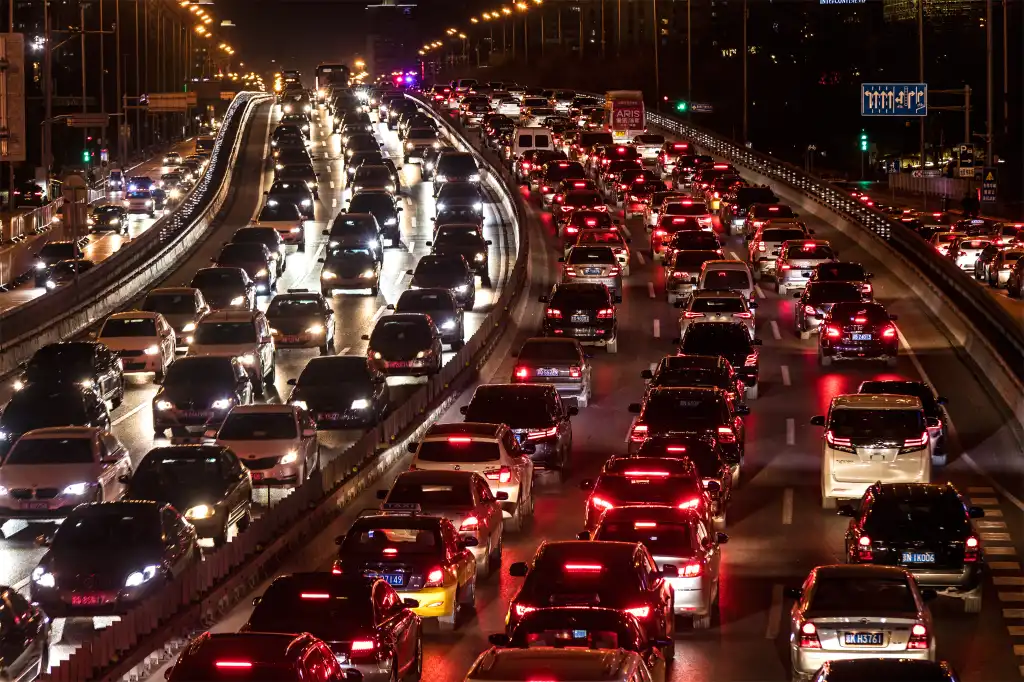 shutterstock 561045331 traffic jam at night on second ring road downtown Beijing