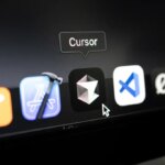 Poznan, Poland – April 14, 2025: Close-up of Cursor app icon on the macOS dock, showcasing a modern code editor enhanced with AI features for developers