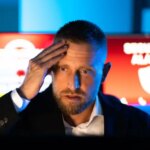 man reacting to ransomware attack