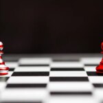 USA flag and China flag print screen on pawn chess.It is symbol of tariff trade war and tax barrier between United States of America and China.-Image.