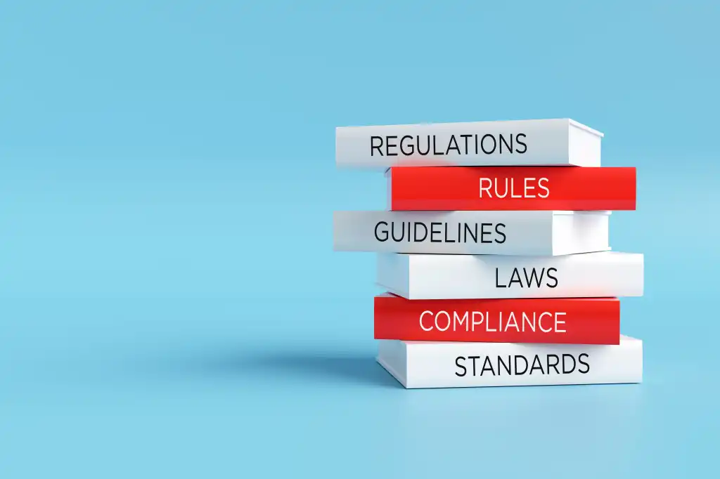 Books forming a stack with words regulations, rules, guidelines, laws, compliance and standards, compliance concept. 3D render.