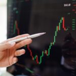 A picture of someone trading with a chart