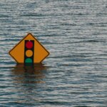 traffic light sign in a flood