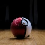 Red and white round plastic toy