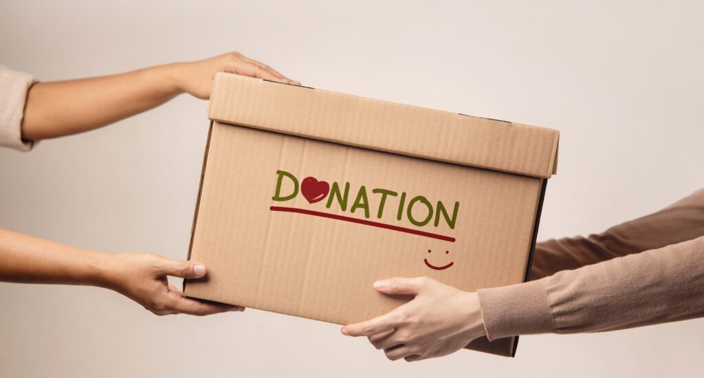 A picture of a box with "donation" written on it