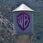 A picture of the Warner Brothers logo on a water tower