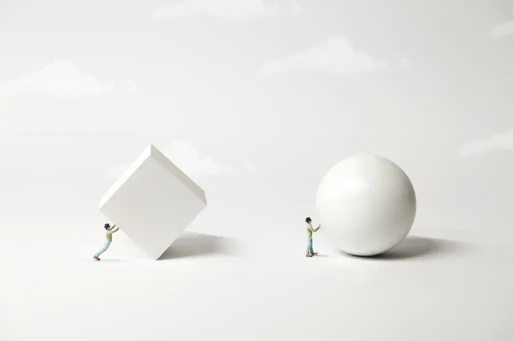 Surreal minimalist conceptual diagram of man pushing pushing block versus man pushing a ball. White objects against a gray background with white clouds. Hard way versus easy way. Evolution of ideas. Technology innovation. .