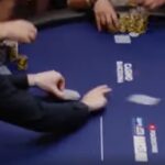 A picture of a dealer using the slide method to deal cards
