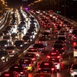 shutterstock 561045331 traffic jam at night on second ring road downtown Beijing