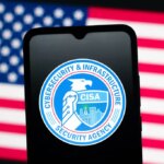 The United States Cybersecurity and Infrastructure Security Agency (CISA) logo is seen displayed on a smartphone screen. October 13, 2025, United States