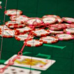 A rising graph overlayed over a picture of tournament poker chips