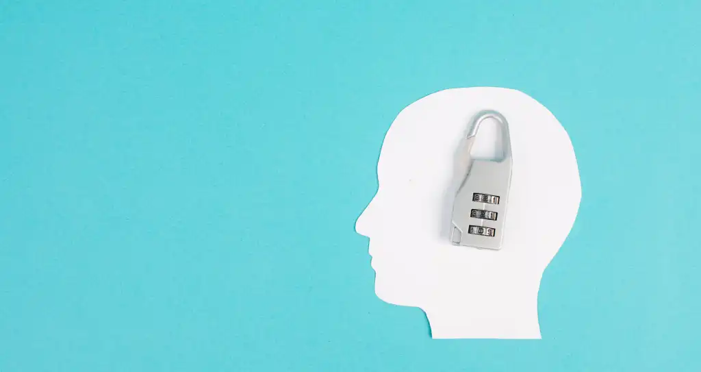 shutterstock 2160537939 Silhouette of a head with a lock, lockout from computer cloud, safety concept, mental health, protection of thoughts