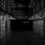 Empty jail cells in a prison.