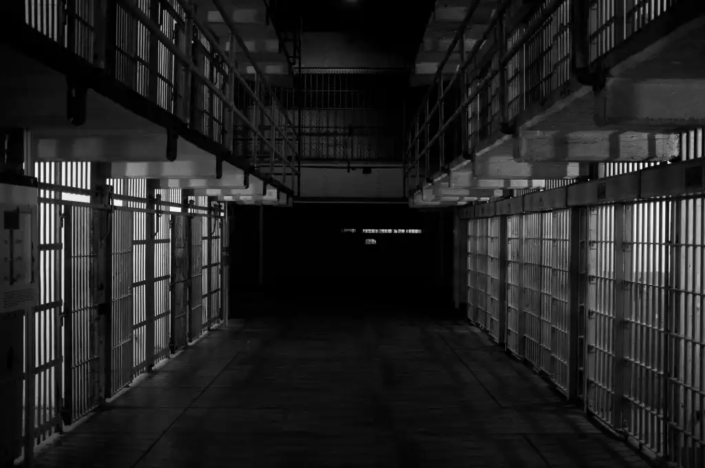 Empty jail cells in a prison.