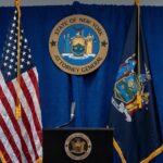 A picture of the press podium for the New York AG