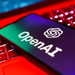 Prague, Czechia - 7 23 2024: Smartphone on surface showing OpenAI logo. OpenAI is a non-profit organization for artificial intelligence research.